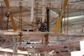 The 1/3 scale WRIGHT FLYER model on top of its derrick