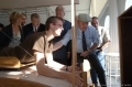 Sébastien BOURDAIS s'essaie au maniement du simulateur de vols type Wright Flyer 1905...