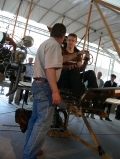 Jef JACQUELIN, Official Pilot of the Flyer, explains to Sebastien BOURDAIS how to control the WRIGHT FLYER 1908 flying replica. 